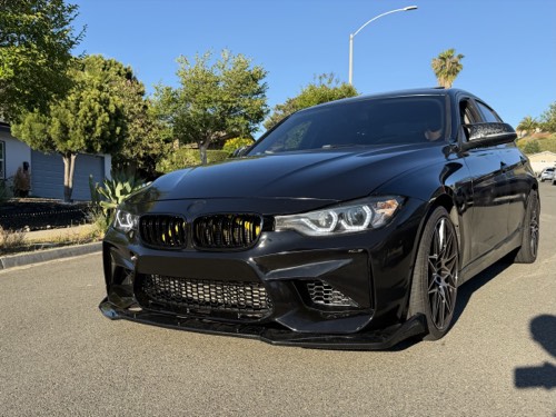 Gloss black BMW 3-Series wrap