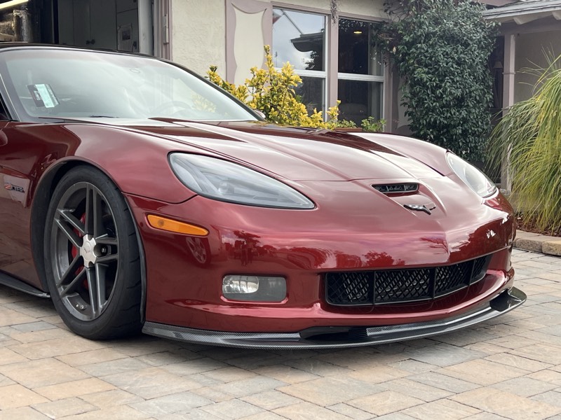 Candy burgundy Chevrolet Corvette Z06 wrapped by Obsidian Wrapz